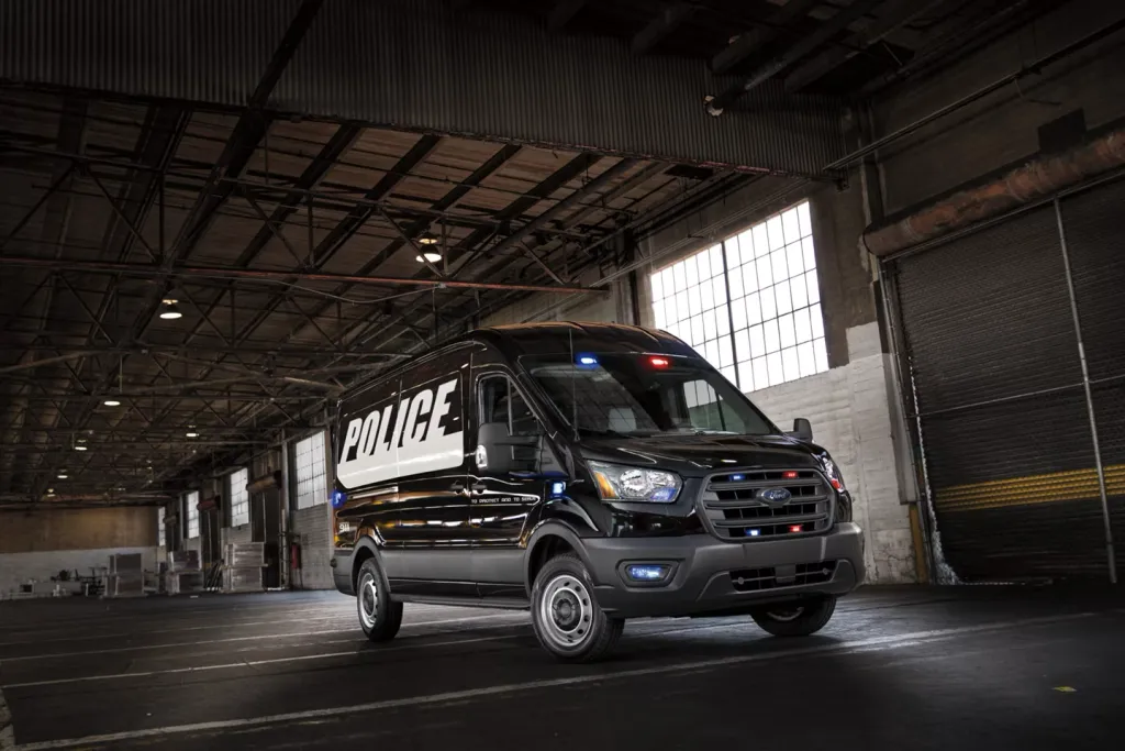 Prisoner transport van with secure compartment
